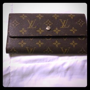 Louis Vuitton wallet in good condition.